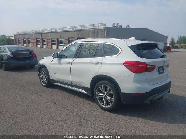 WBXHT3C33G5F65881 BMW X1