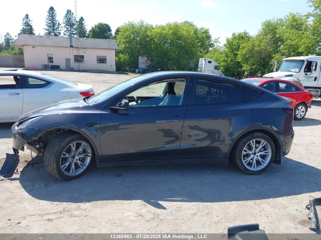 7SAYGDED2RF990104 Tesla Model Y