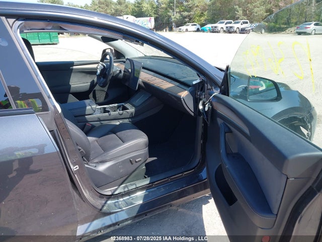 7SAYGDED2RF990104 Tesla Model Y