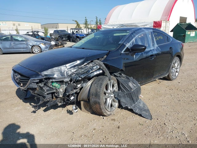 Mazda py 2014 JM1GJ1W52E1101482 Image 2
