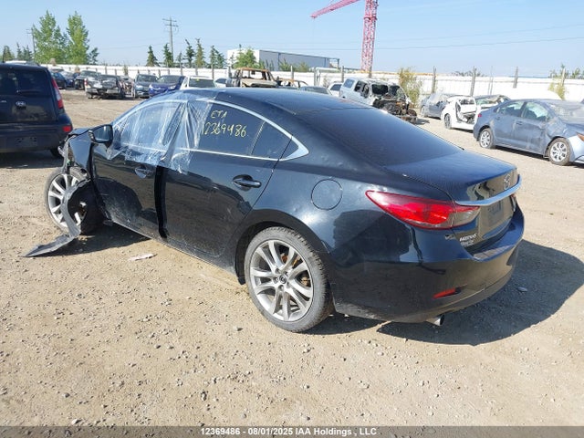 Mazda py 2014 JM1GJ1W52E1101482 Image 3