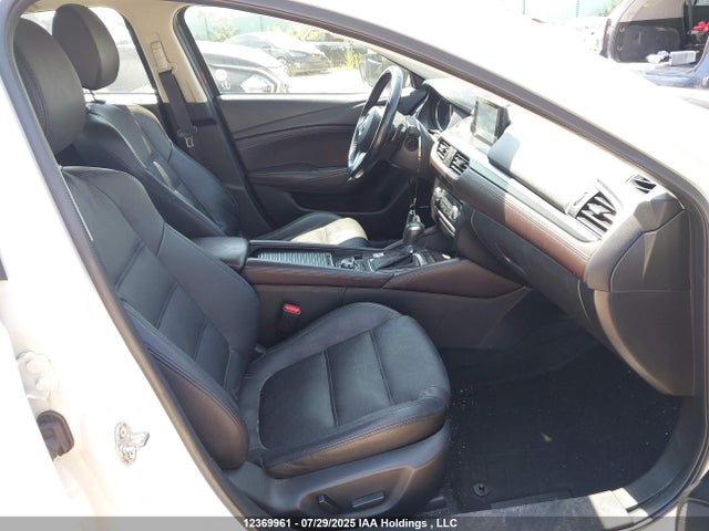 JM1GJ1W56G1438790 Mazda py