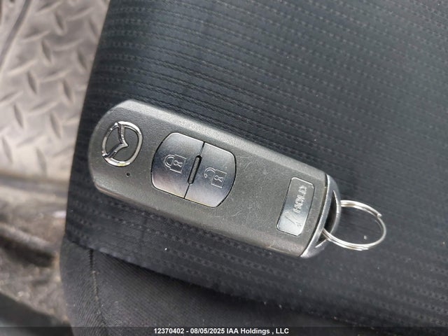 JM1DKFB78K0438115 Mazda pe