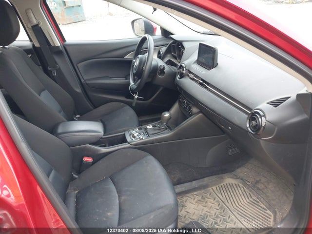 JM1DKFB78K0438115 Mazda pe