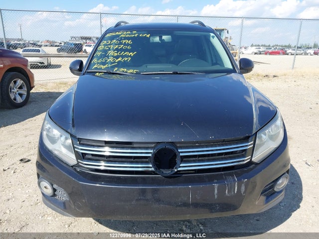 WVGJV3AX4EW597706 Volkswagen Tiguan