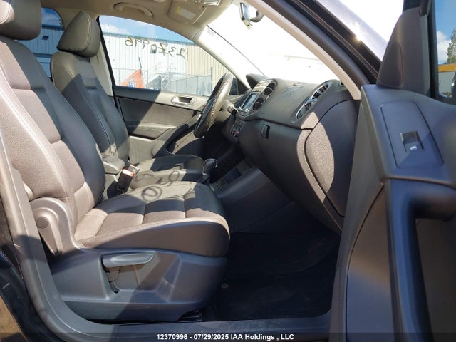 WVGJV3AX4EW597706 Volkswagen Tiguan