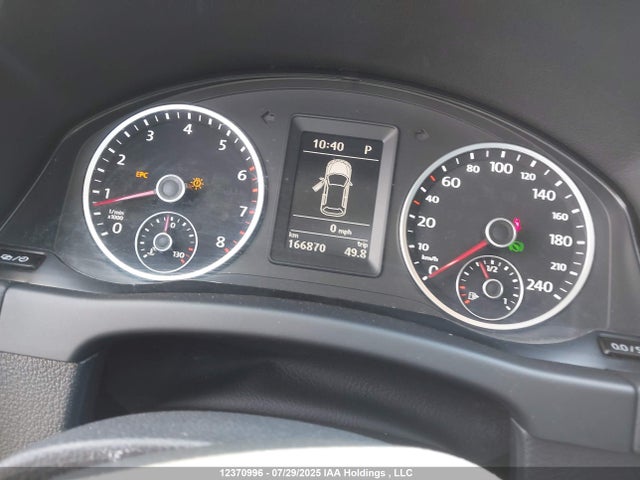 WVGJV3AX4EW597706 Volkswagen Tiguan