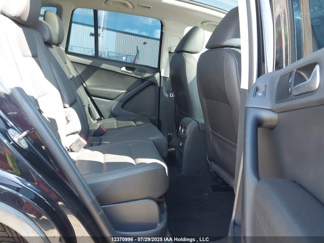 WVGJV3AX4EW597706 Volkswagen Tiguan