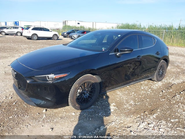 Mazda pyukd 2024 JM1BPBMM2R1701577 Image 2