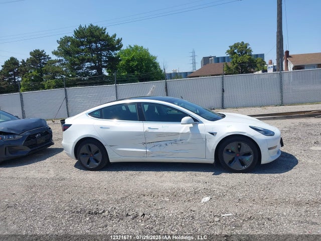 5YJ3E1EA1LF780070 Tesla 2020