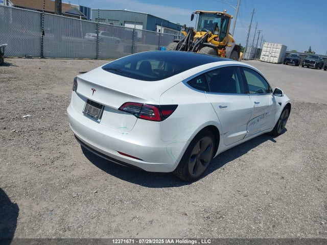 5YJ3E1EA1LF780070 Tesla 2020