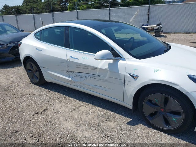 5YJ3E1EA1LF780070 Tesla 2020