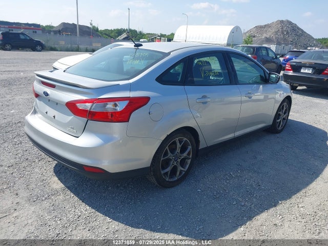 Ford Focus 2014 1FADP3F27EL364838 Image 4
