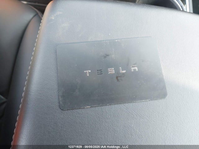 5YJ3E1EB1JF107799 Tesla 2018