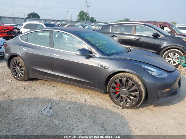 5YJ3E1EB1JF107799 Tesla 2018