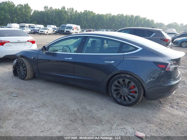 5YJ3E1EB1JF107799 Tesla 2018