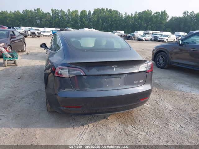 5YJ3E1EB1JF107799 Tesla 2018