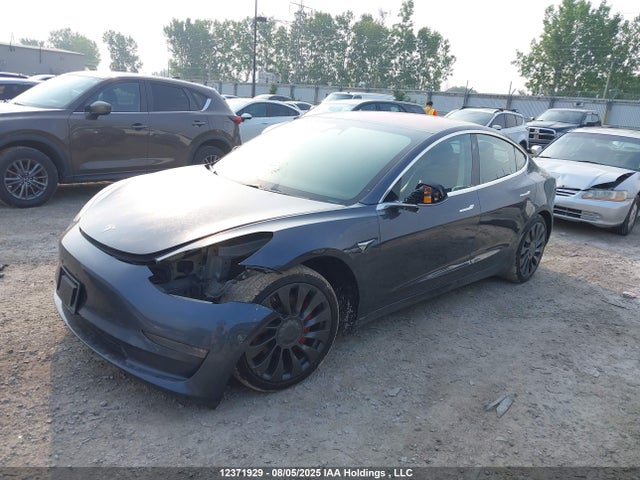 5YJ3E1EB1JF107799 Tesla 2018
