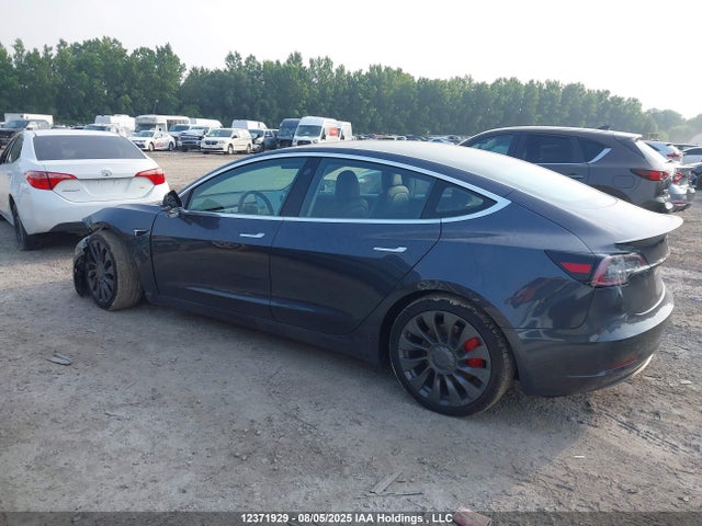 5YJ3E1EB1JF107799 Tesla 2018