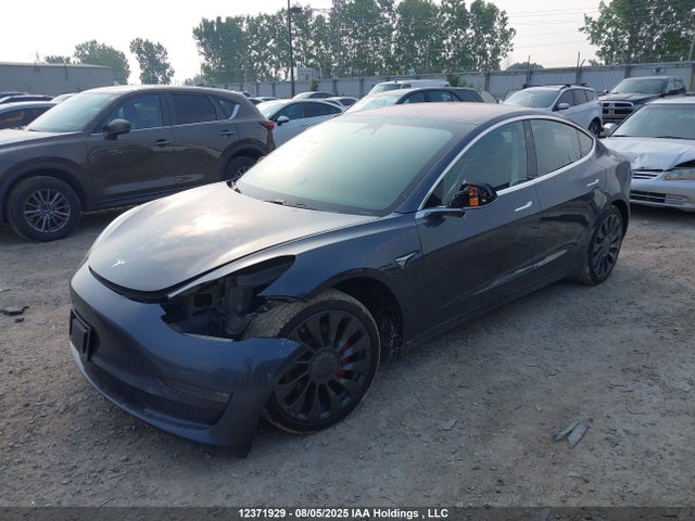 5YJ3E1EB1JF107799 Tesla 2018