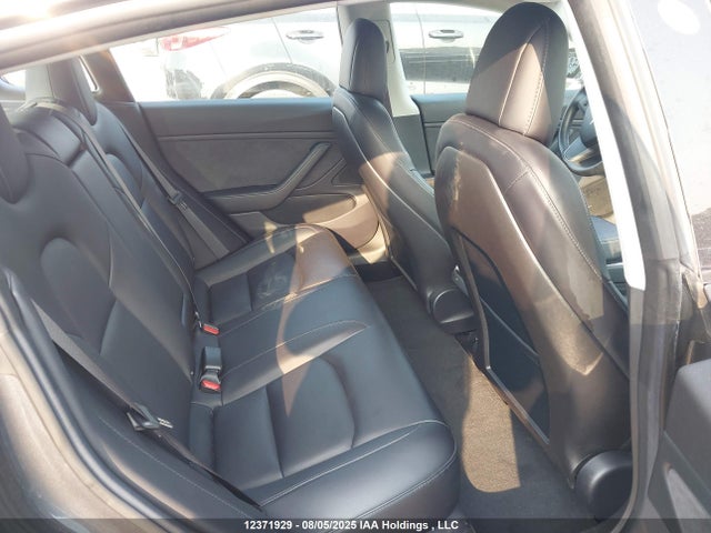 5YJ3E1EB1JF107799 Tesla 2018