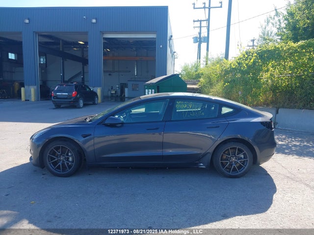 5YJ3E1EB3PF688134 Tesla MODEL 3