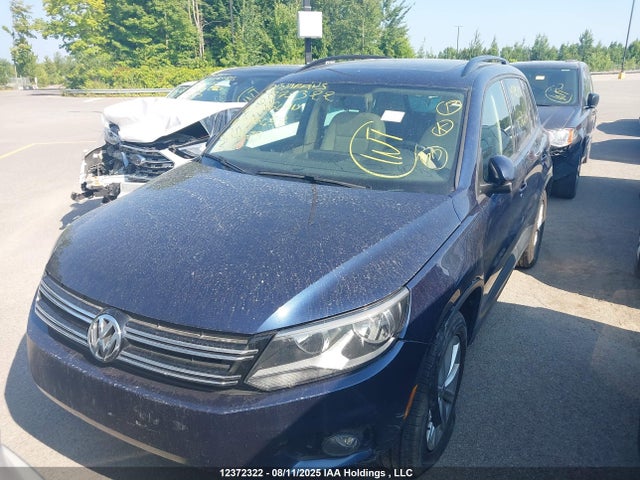 WVGJV3AX9EW586457 Volkswagen Tiguan