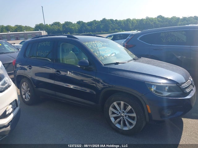 WVGJV3AX9EW586457 Volkswagen Tiguan