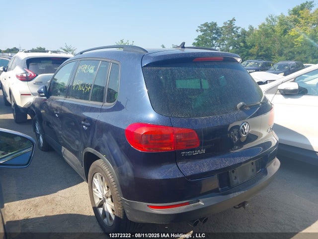 WVGJV3AX9EW586457 Volkswagen Tiguan