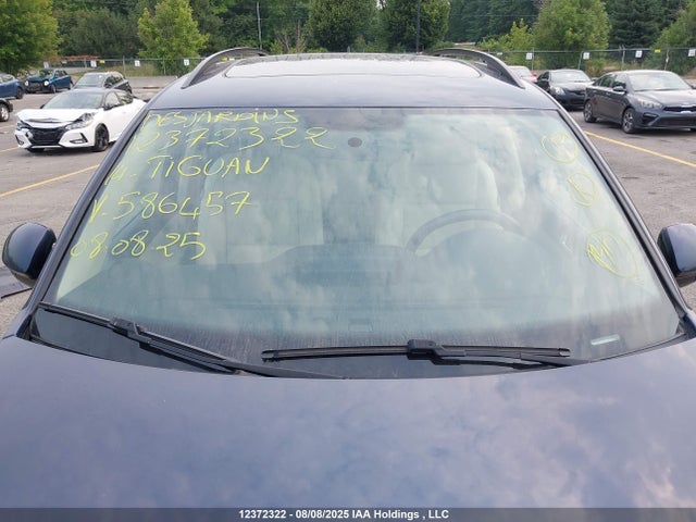 WVGJV3AX9EW586457 Volkswagen Tiguan