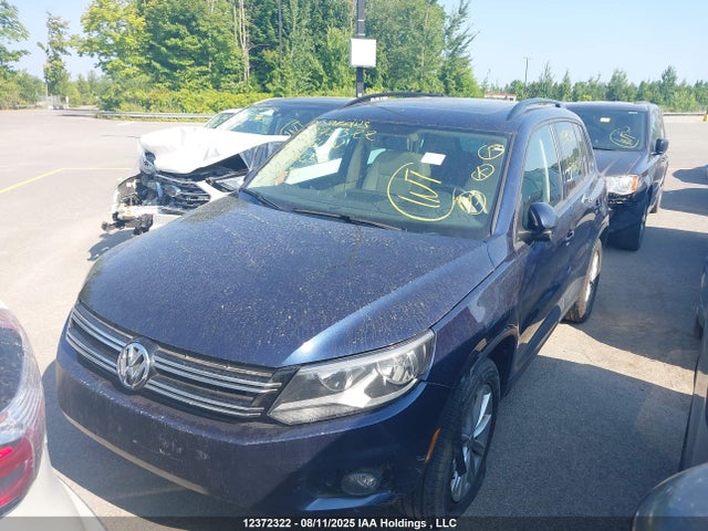 WVGJV3AX9EW586457 Volkswagen Tiguan