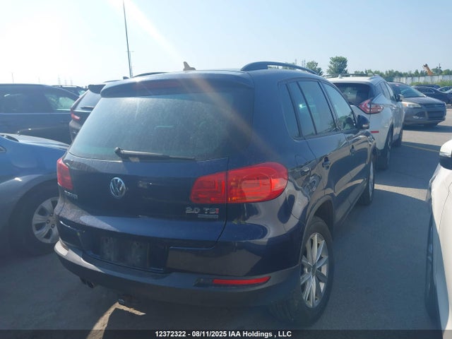WVGJV3AX9EW586457 Volkswagen Tiguan