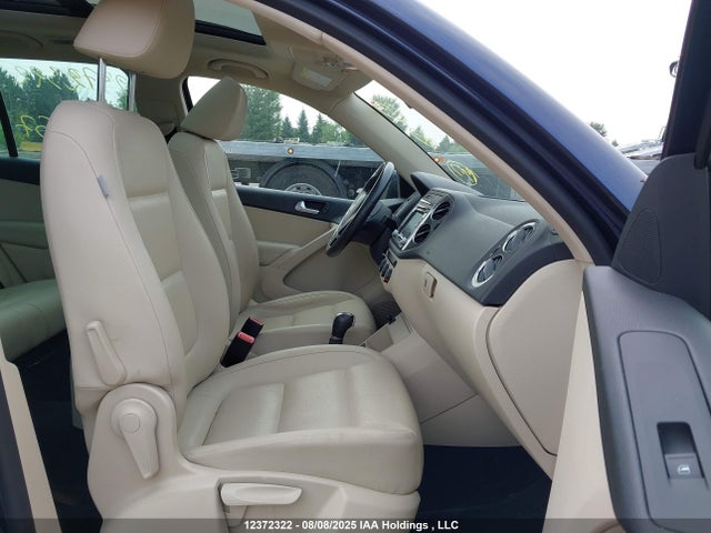 WVGJV3AX9EW586457 Volkswagen Tiguan