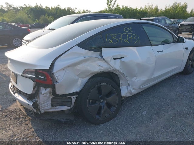 5YJ3E1EA4NF339469 Tesla MODEL 3