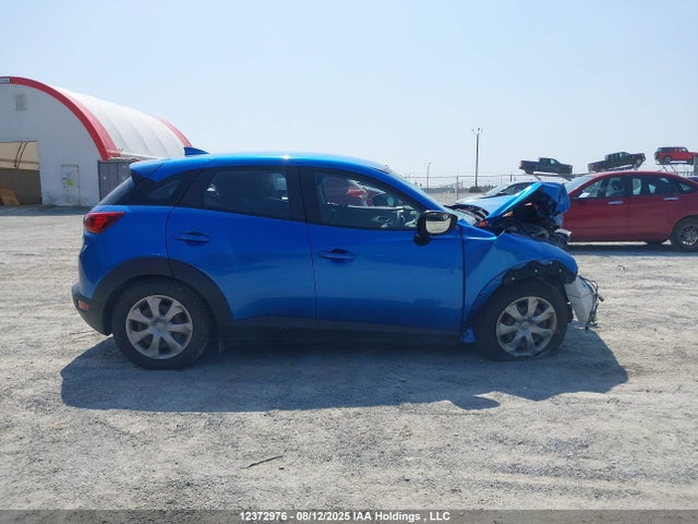 JM1DKFB74G0133203 Mazda pe