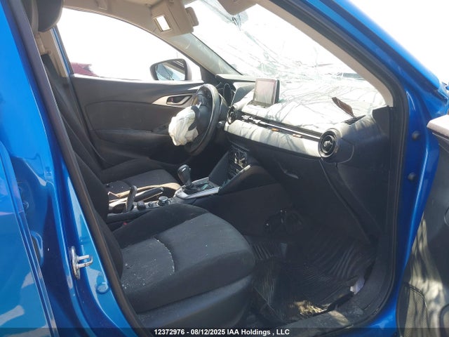 JM1DKFB74G0133203 Mazda pe