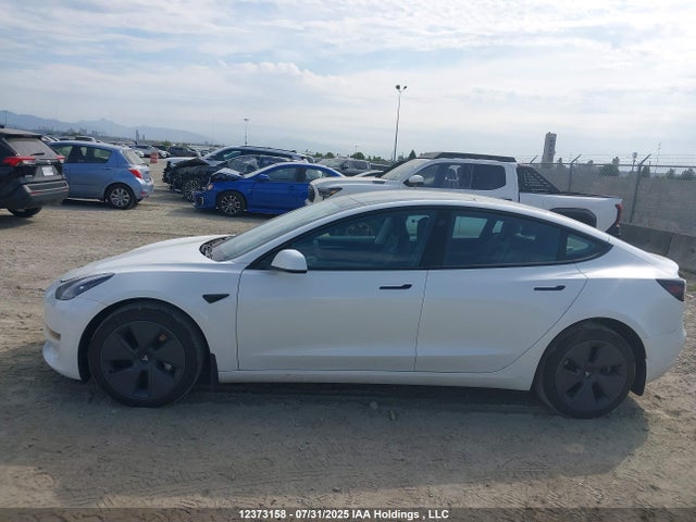 5YJ3E1EA6PF489957 Tesla 2023