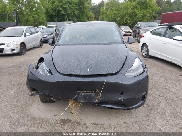Tesla Model Y 2024 7SAYGDEE2RF012257 Image 12