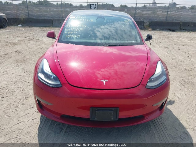 5YJ3E1EB2NF309234 Tesla 2022