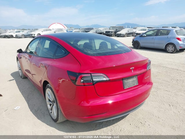 5YJ3E1EB2NF309234 Tesla 2022