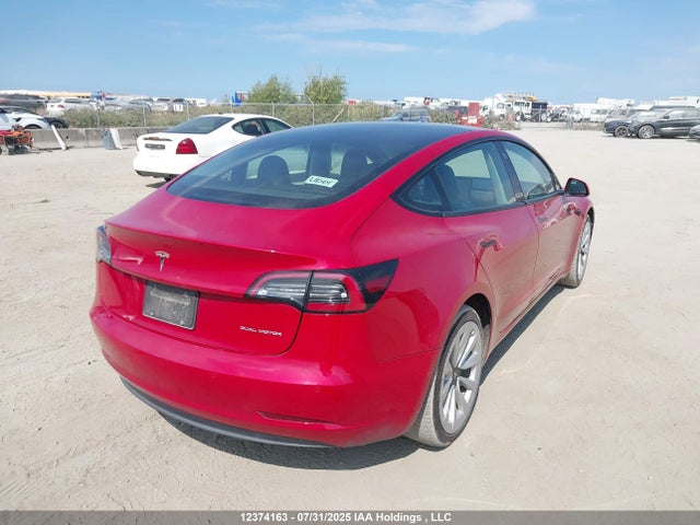 5YJ3E1EB2NF309234 Tesla 2022