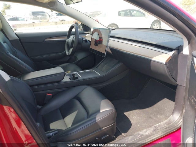 5YJ3E1EB2NF309234 Tesla 2022