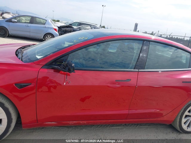 5YJ3E1EB2NF309234 Tesla 2022