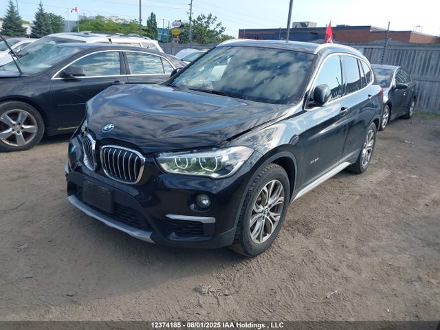 BMW X1 2017 WBXHT3C33H5F79006 Image 2