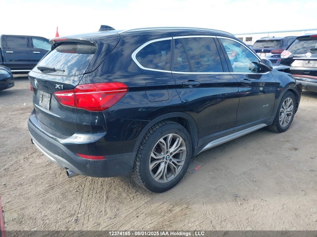 BMW X1 2017 WBXHT3C33H5F79006 Image 4