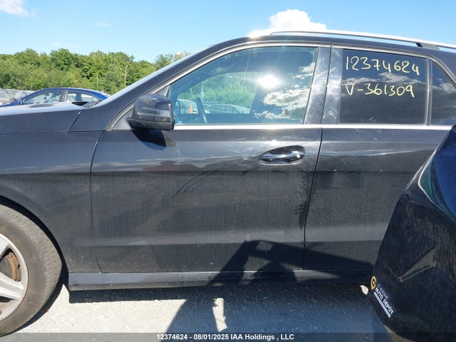 4JGDA2EB0EA361309 Mercedes-Benz Ml-Class