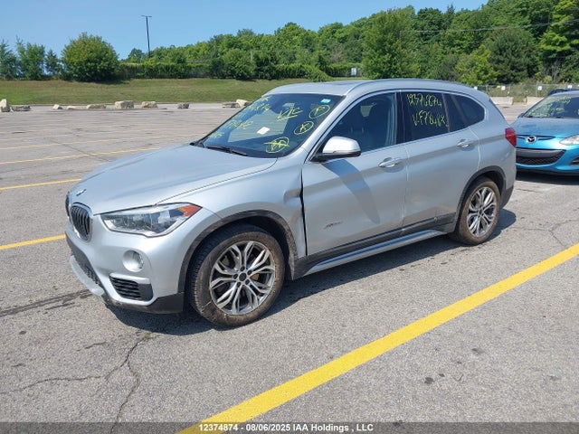 BMW X1 2017 WBXHT3C38H5F78482 Image 2