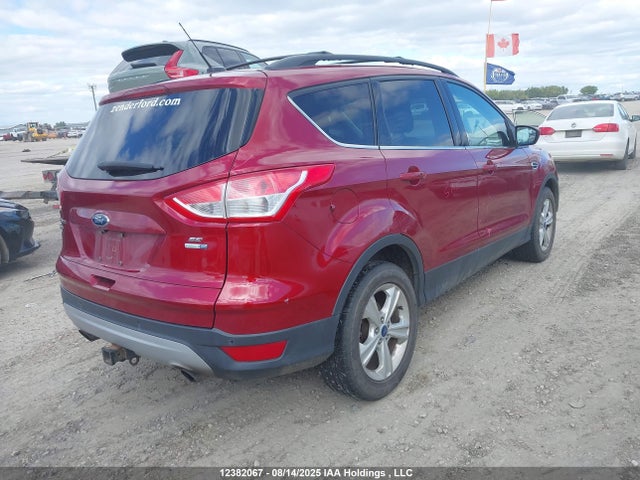1FMCU9G9XEUE16384 Ford 2014