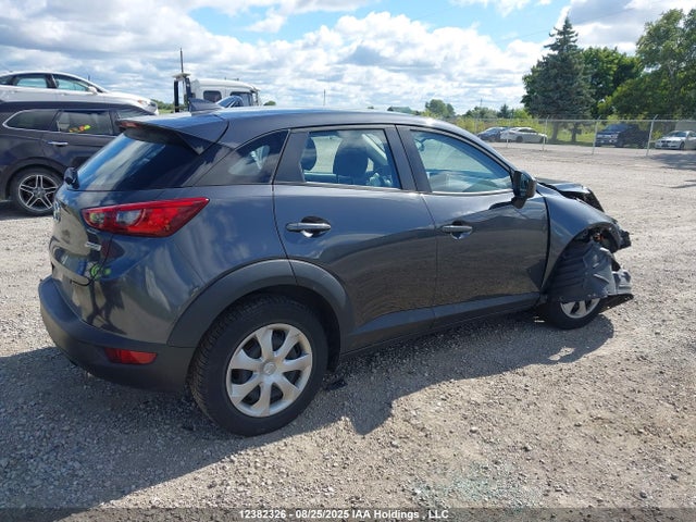 Mazda pe 2016 JM1DKDB75G0132551 Image 4