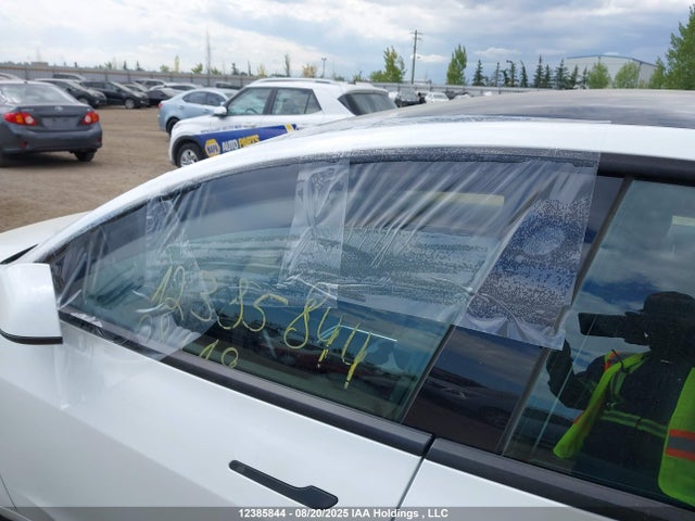 5YJ3E1EA9PF401385 Tesla MODEL 3